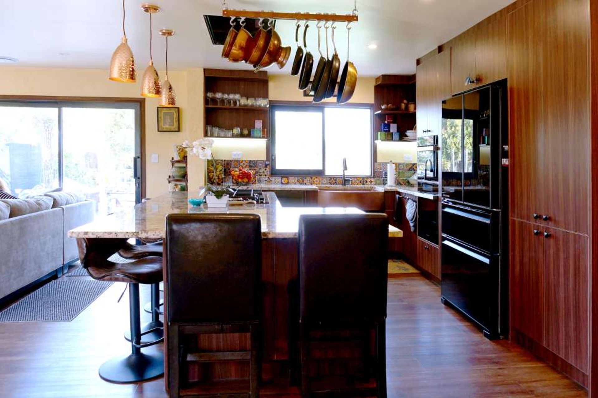 AFTER the kitchen was renovated. The wall between the kitchen and living room was demolished to create an open living space.