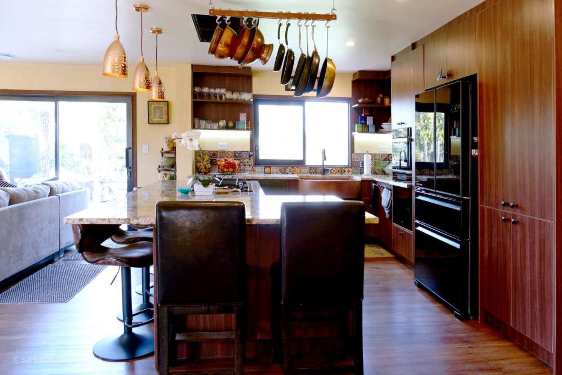 AFTER the kitchen was renovated. The wall between the kitchen and living room was demolished to create an open living space.