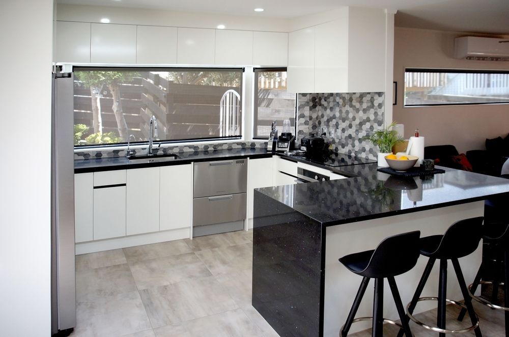 Lynette and Henry's Kitchen in Bucklands Beach was remodeled to better suit their family's lifestyle.  