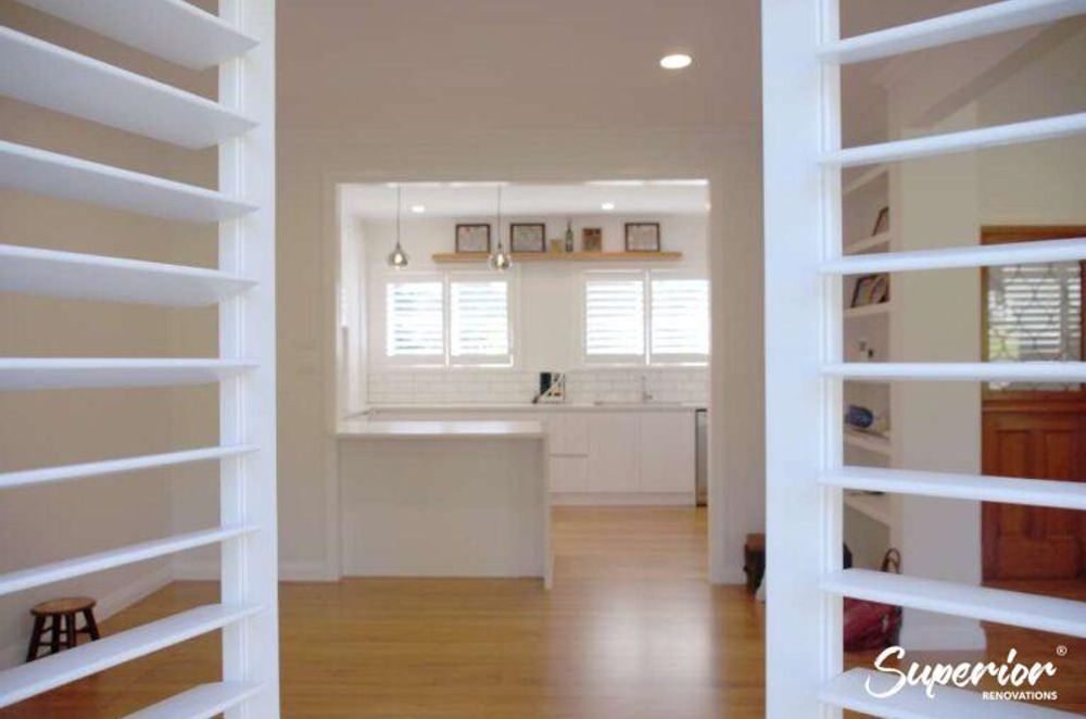 A clean modern look with a beautiful contrast of white with the classic timber