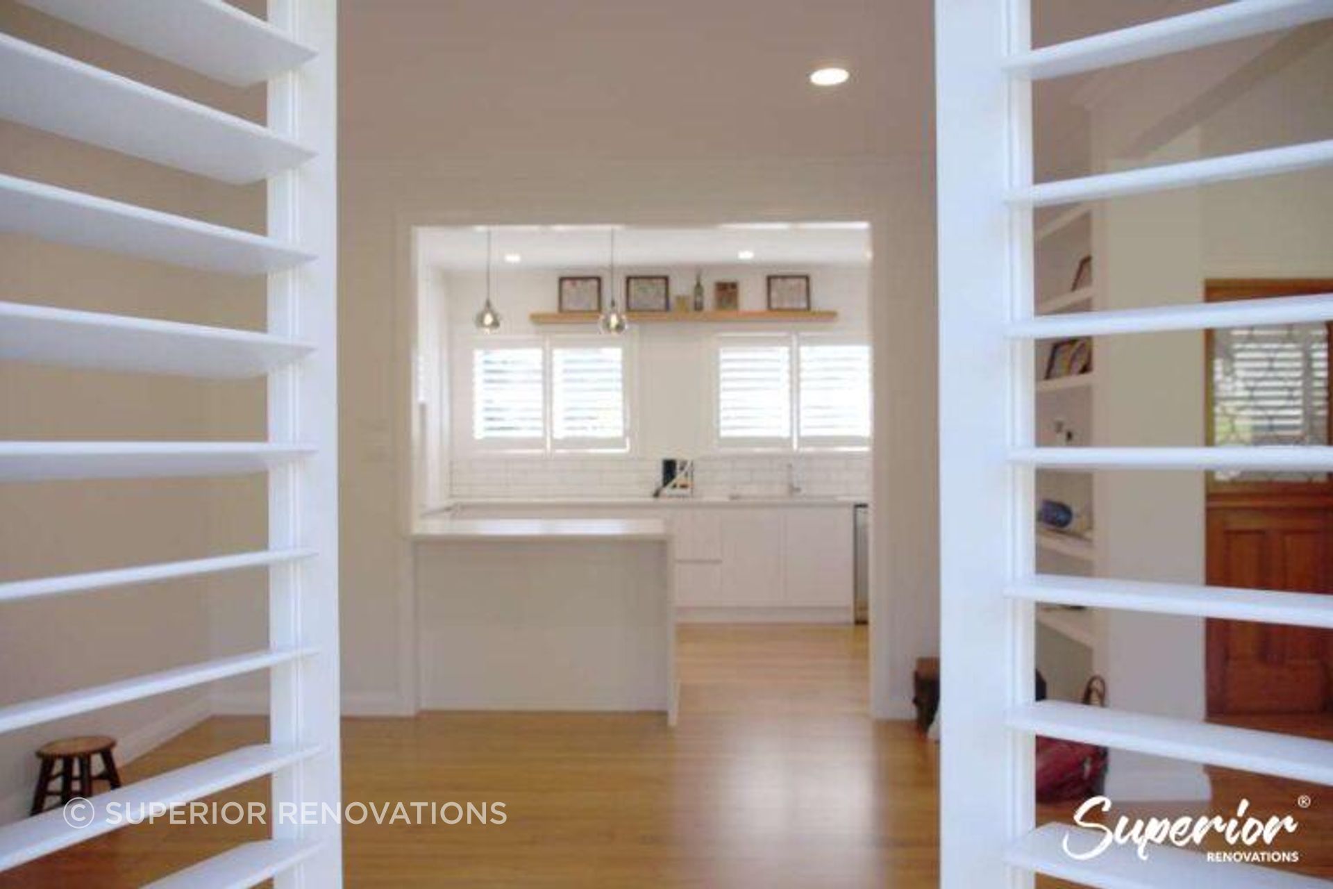 A clean modern look with a beautiful contrast of white with the classic timber