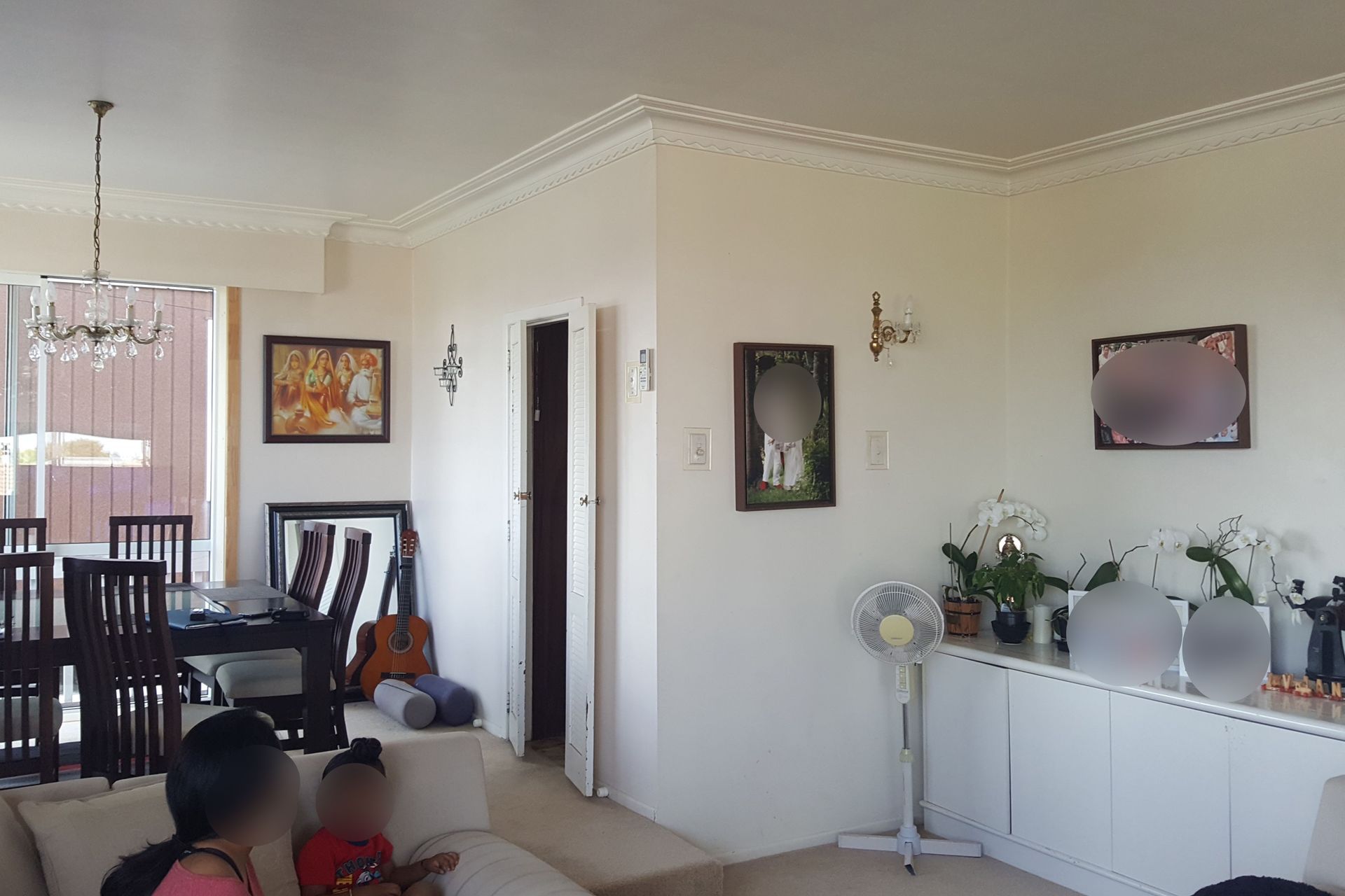 The wall between the living space and kitchen was demolished (BEFORE renovation