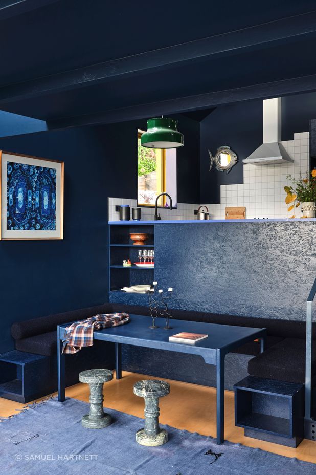 The booth seating in the dining nook was made by Fieldcraft and the table was a Trade Me find. “Everything’s the same colour, but we're using texture as the vehicle to move through the space,” says Natalie.