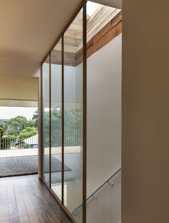 Glazing is used to open up the stairwell. Photo: David Straight