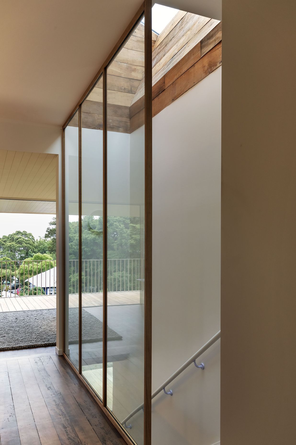 Glazing is used to open up the stairwell. Photo: David Straight