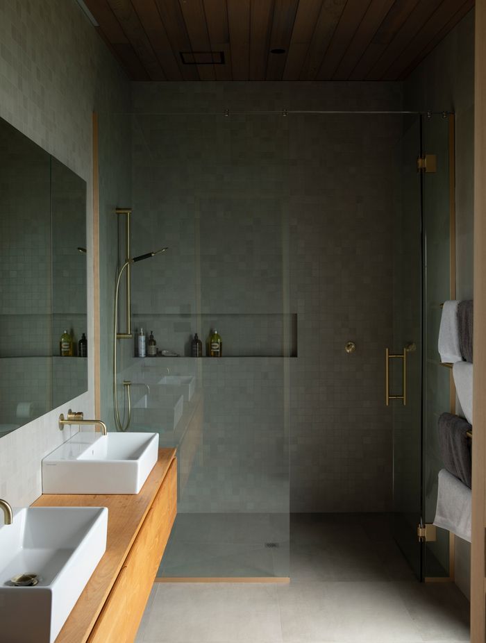 The ensuite bathroom offers a tranquil retreat for the parents. Image credit: David Straight