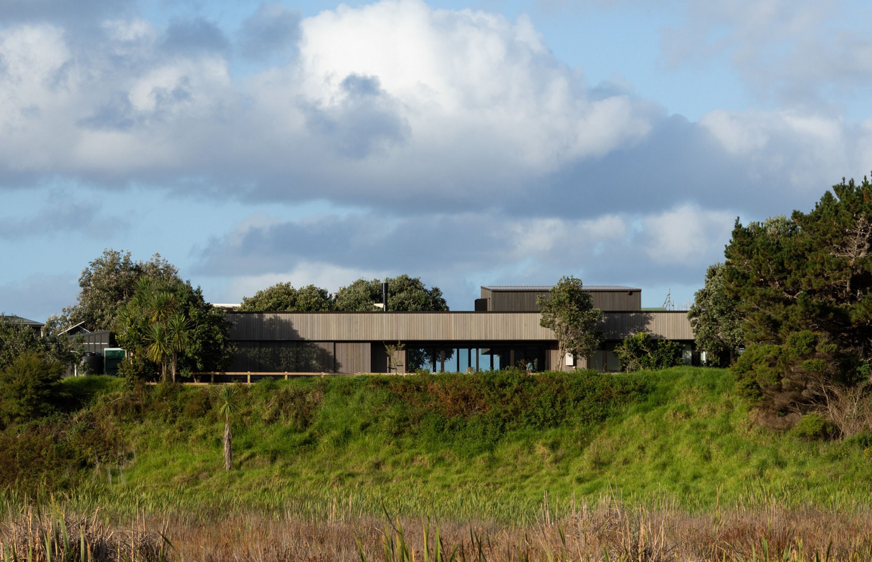 The home seen from the wetland reserve below. Image credit: David Straight