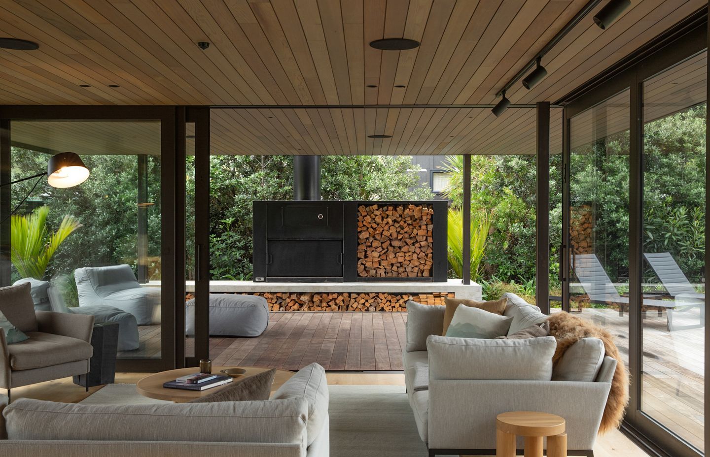 Full height aluminium sliders mean the boundaries between interior and exterior are blurred. Image credit: David Straight