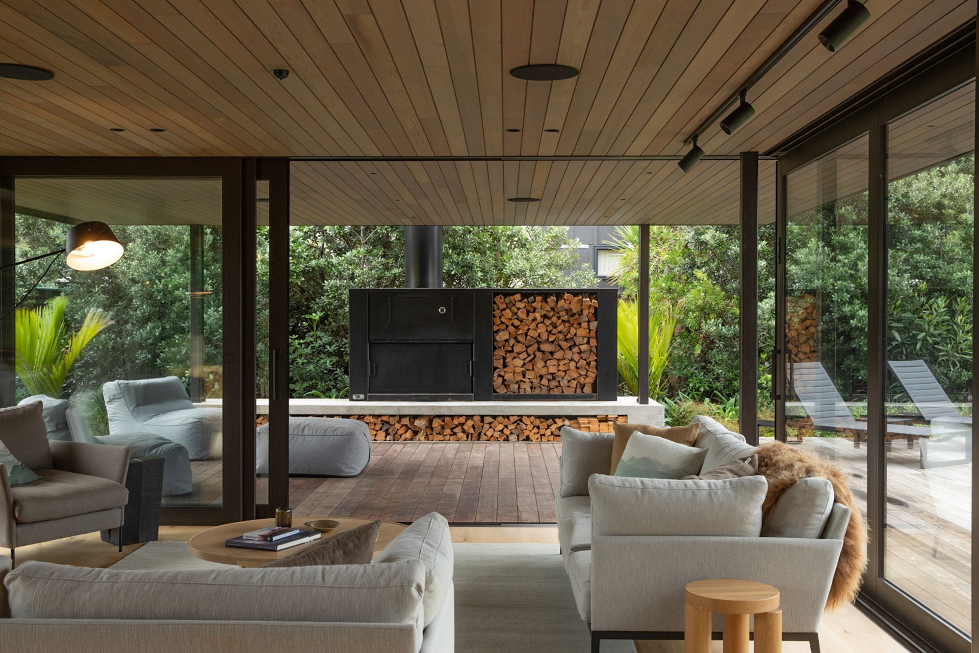 Full height aluminium sliders mean the boundaries between interior and exterior are blurred. Image credit: David Straight