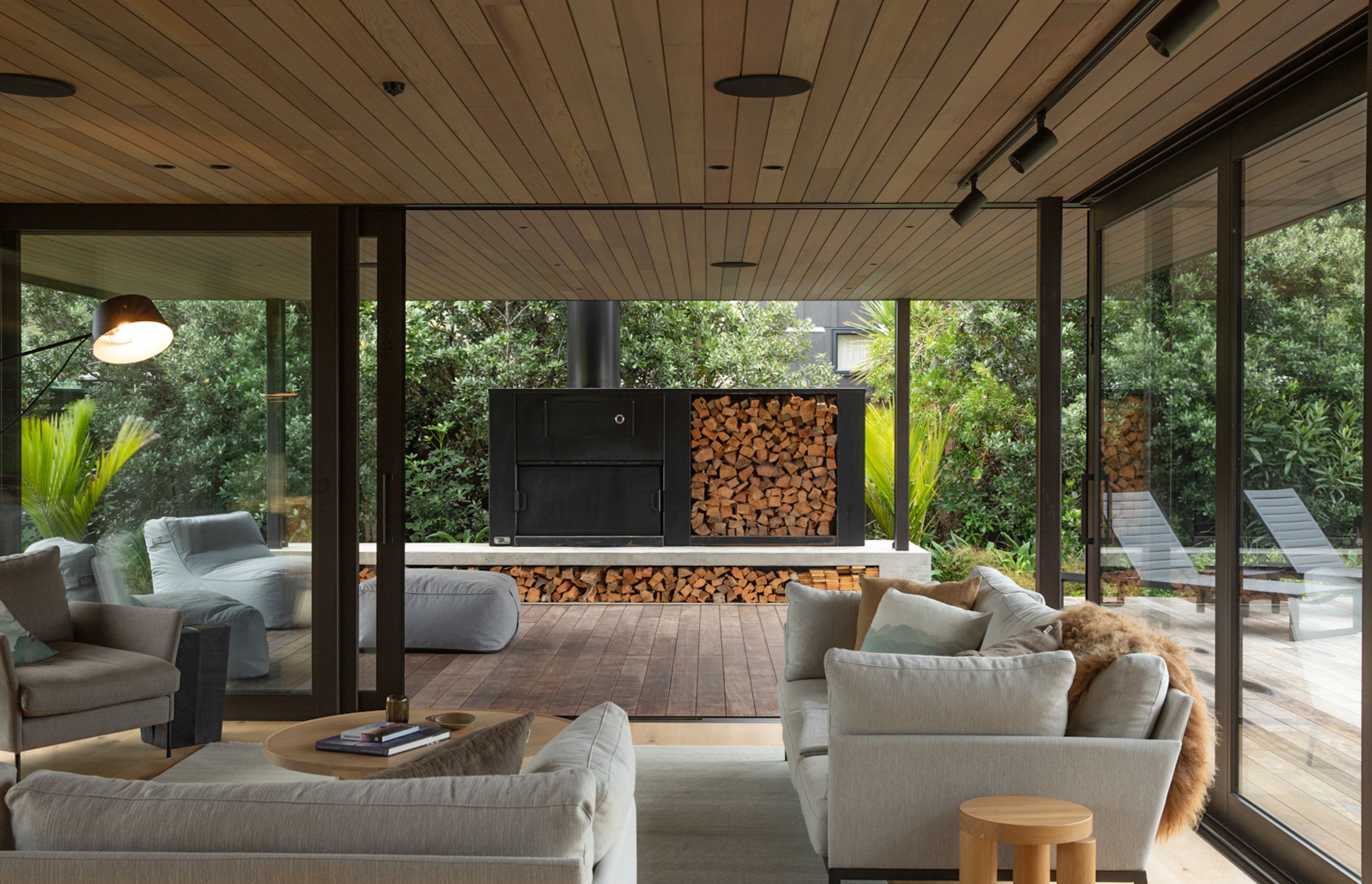 Full height aluminium sliders mean the boundaries between interior and exterior are blurred. Image credit: David Straight