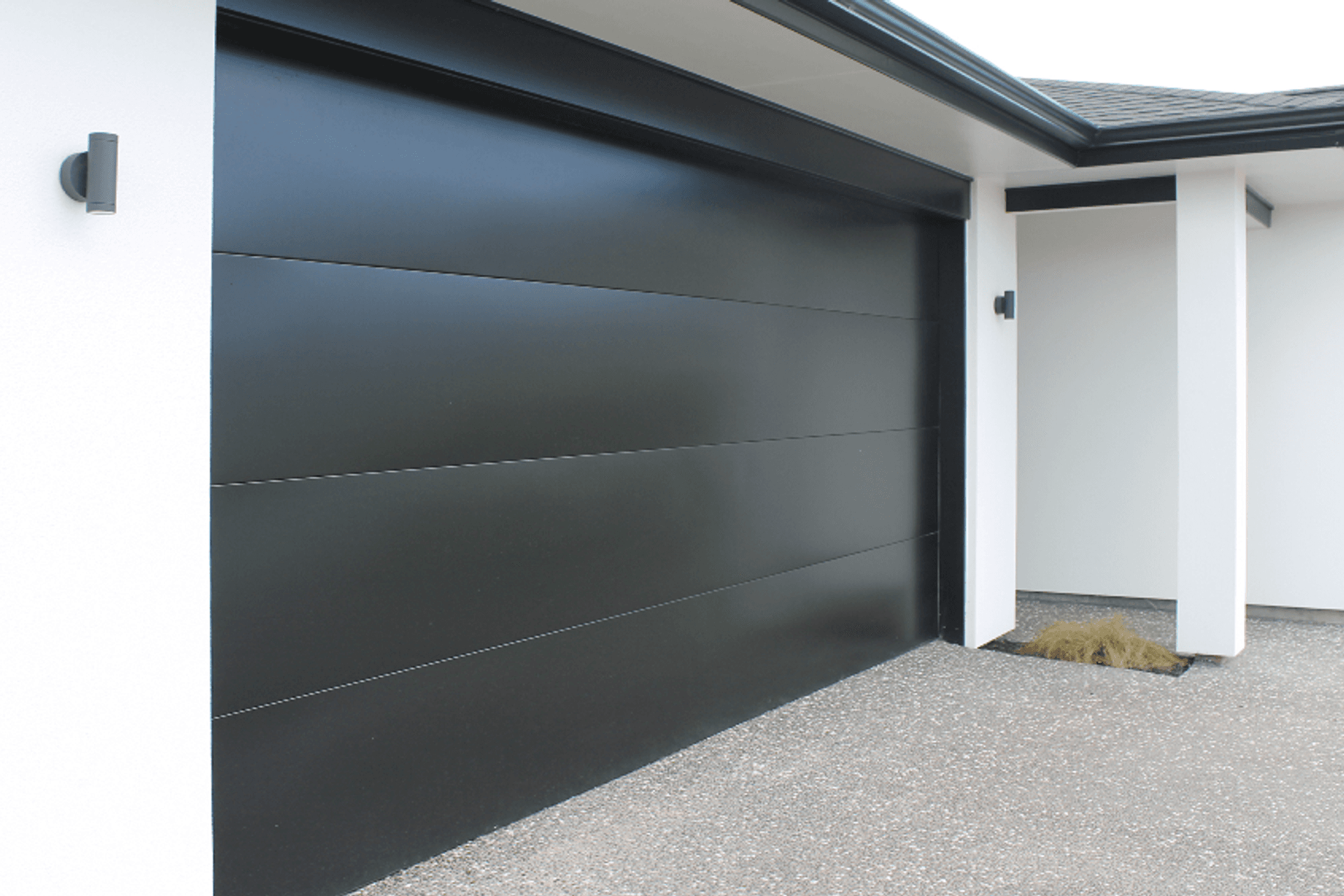 Dominator Sierra is a visually crisp door choice with fine horizontal lines that complement most modern cladding designs and is available in an array of powder coated and zincalume finishes.