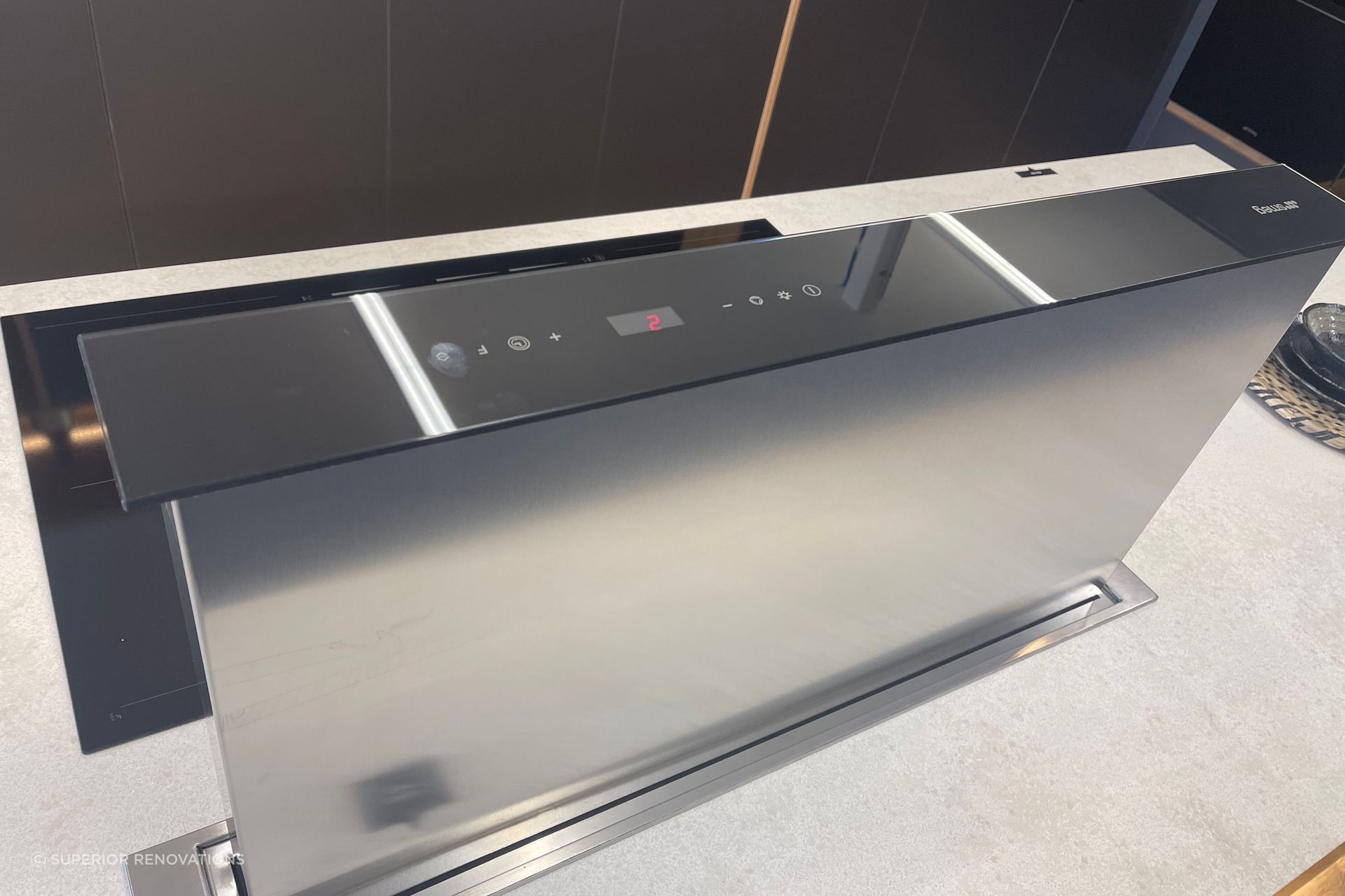 Electric downdraft rangehood.