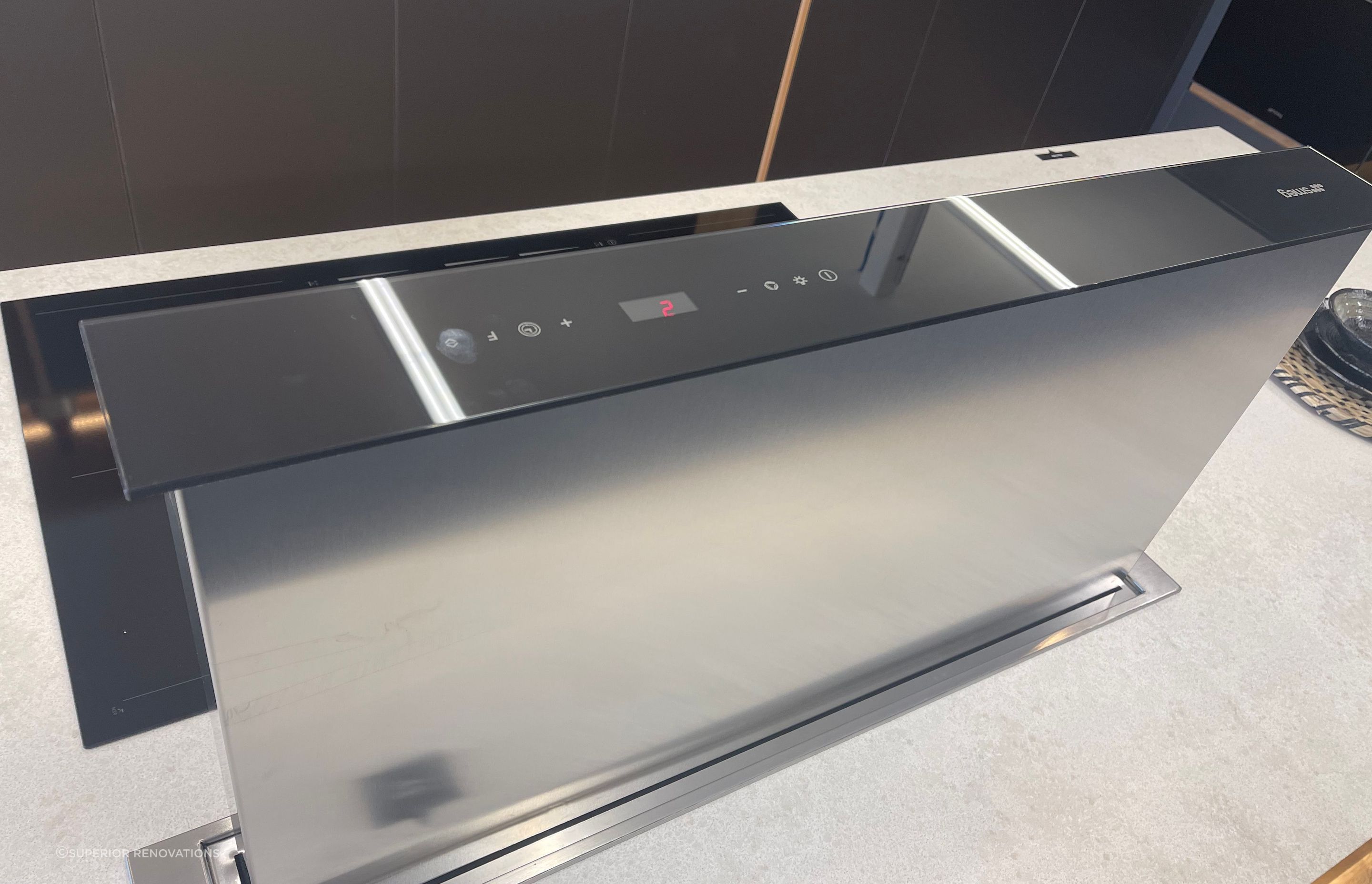 Electric downdraft rangehood.