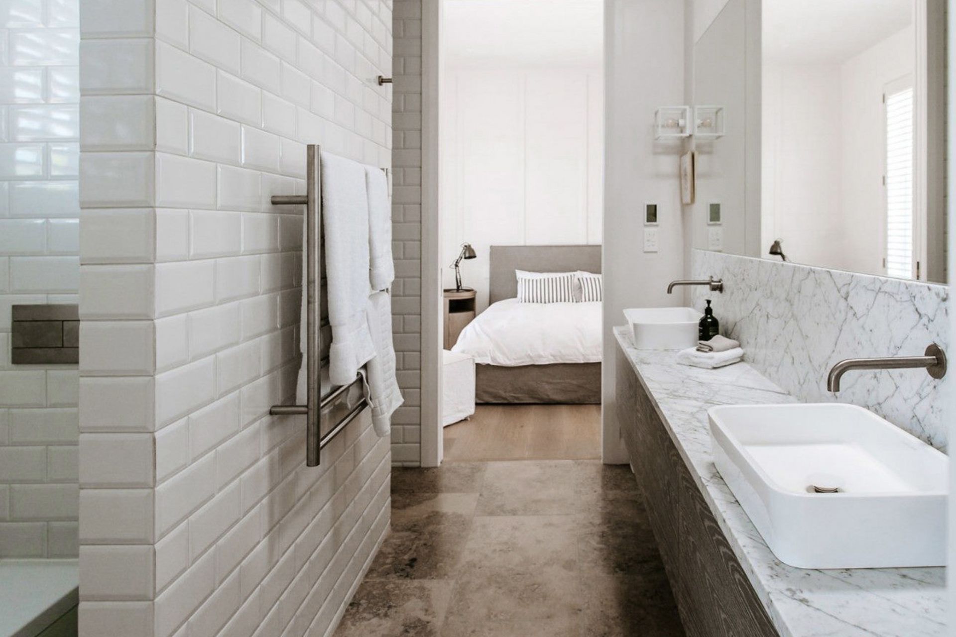 The French barn aesthetic of the interiors in this lodge in Matakana, by Schwarz Design, balances elegance with liveable luxury.