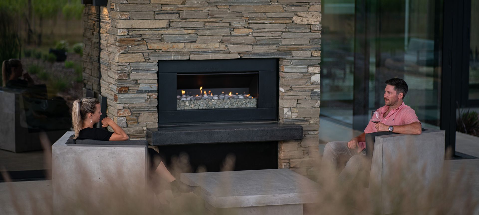The Escea Outdoor Gas Fireplace offers instant warmth and ambience.