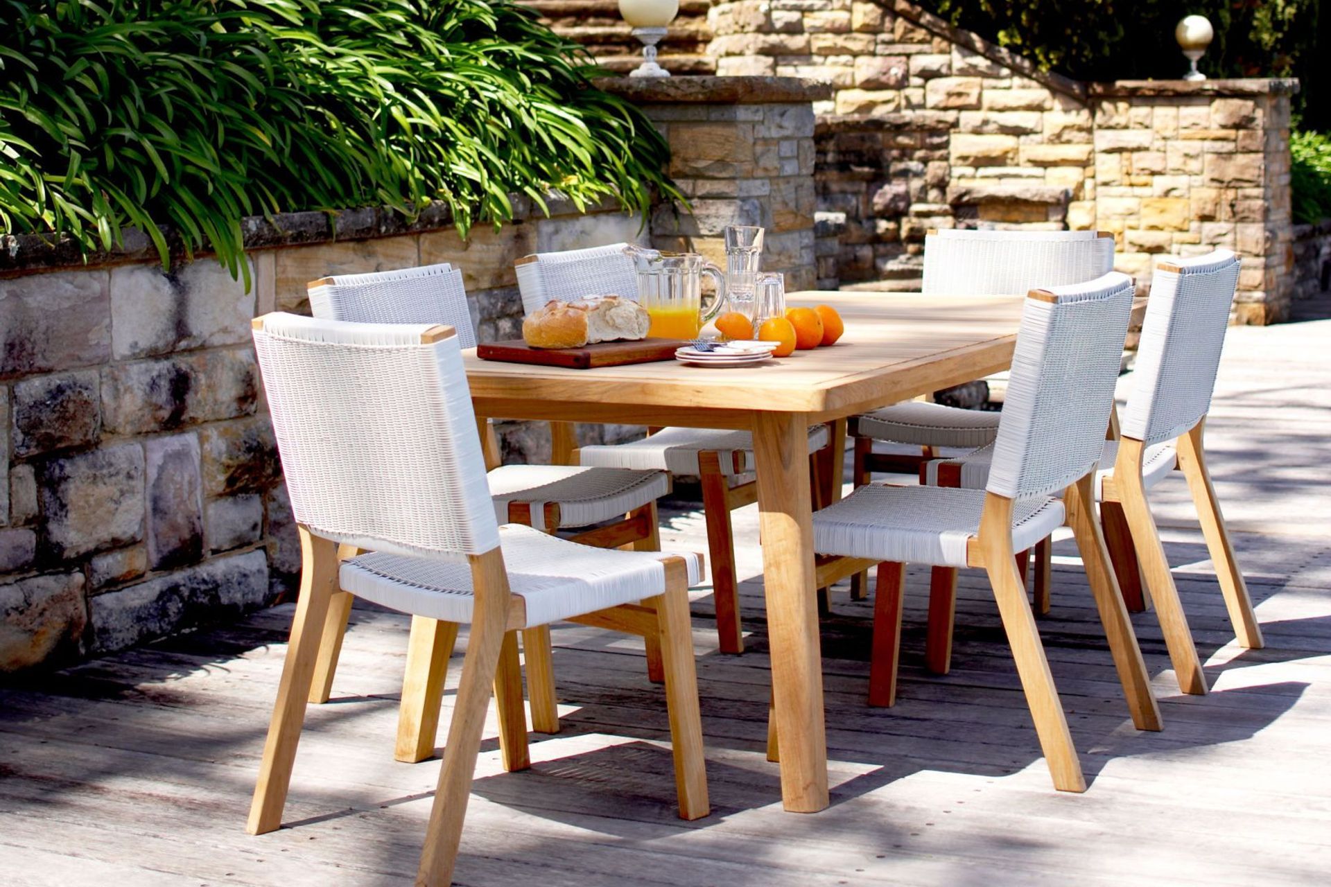 Teak frames and a Rehau wicker weave means Barwon Outdoor Dining Chairs can be left outside in the full Australian climate all day, every day.