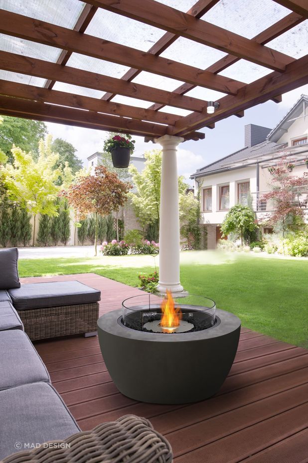 The simple design of this fire bowl is well suited to a backyard area with a timber trim.