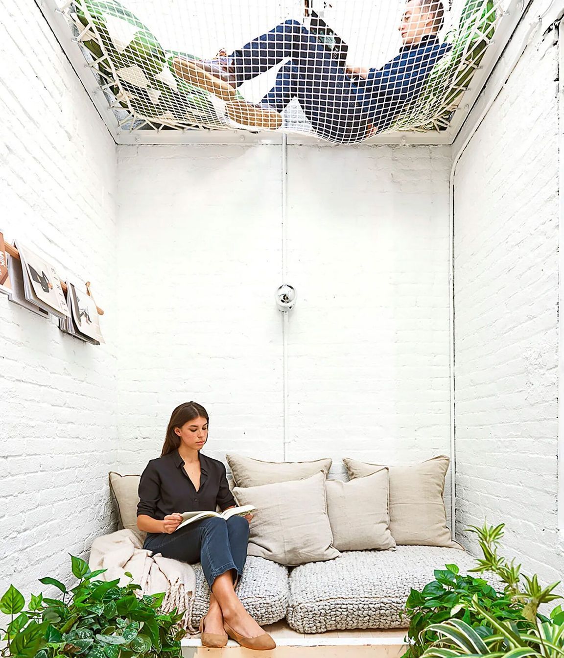 Converted elevator shaft lounge area in the office of Elizabeth Roberts Architects