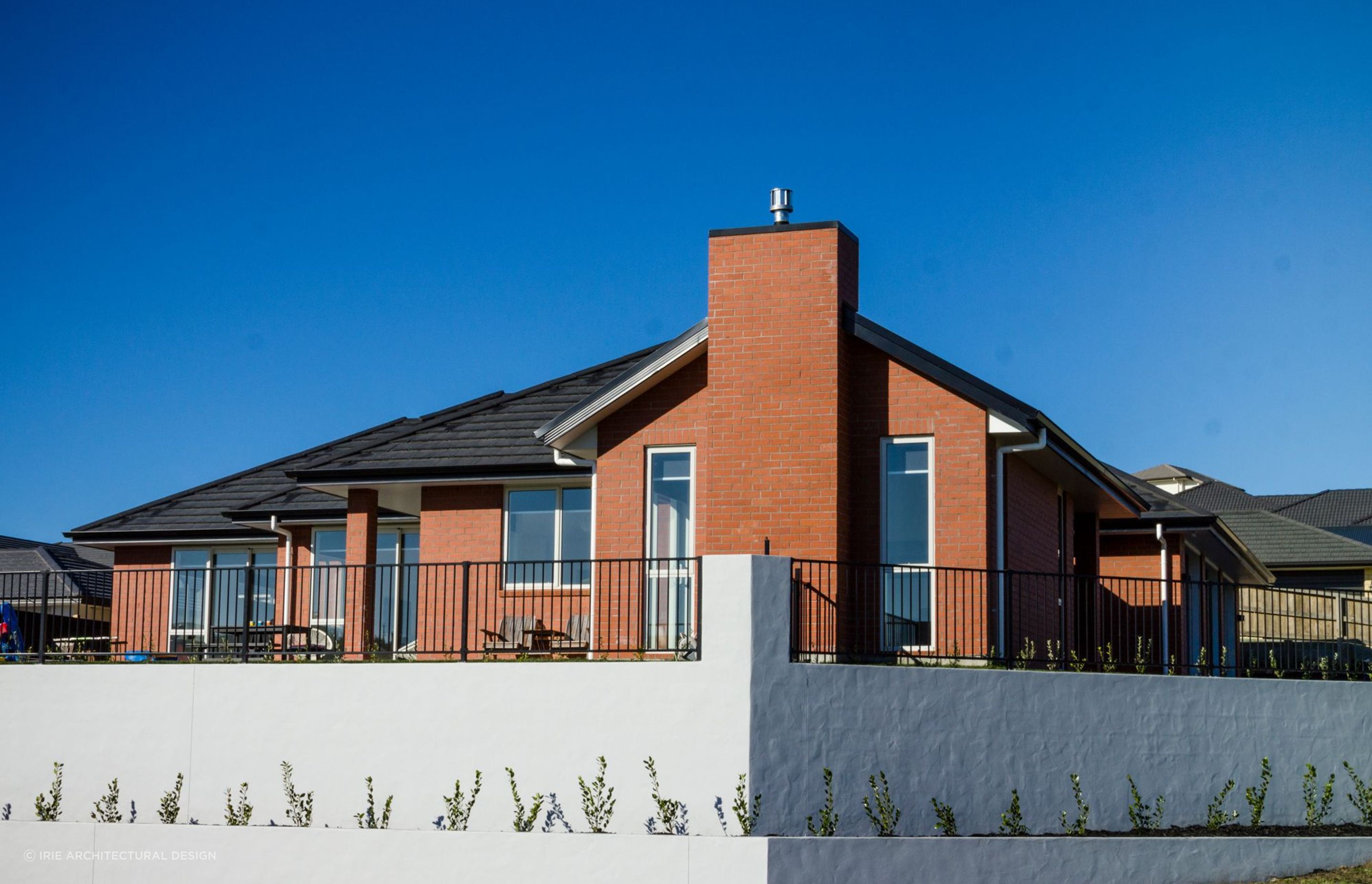 A solid family home in Bethlehem constructed with refurbished with brick veneer cladding by Irie Architectural Design.