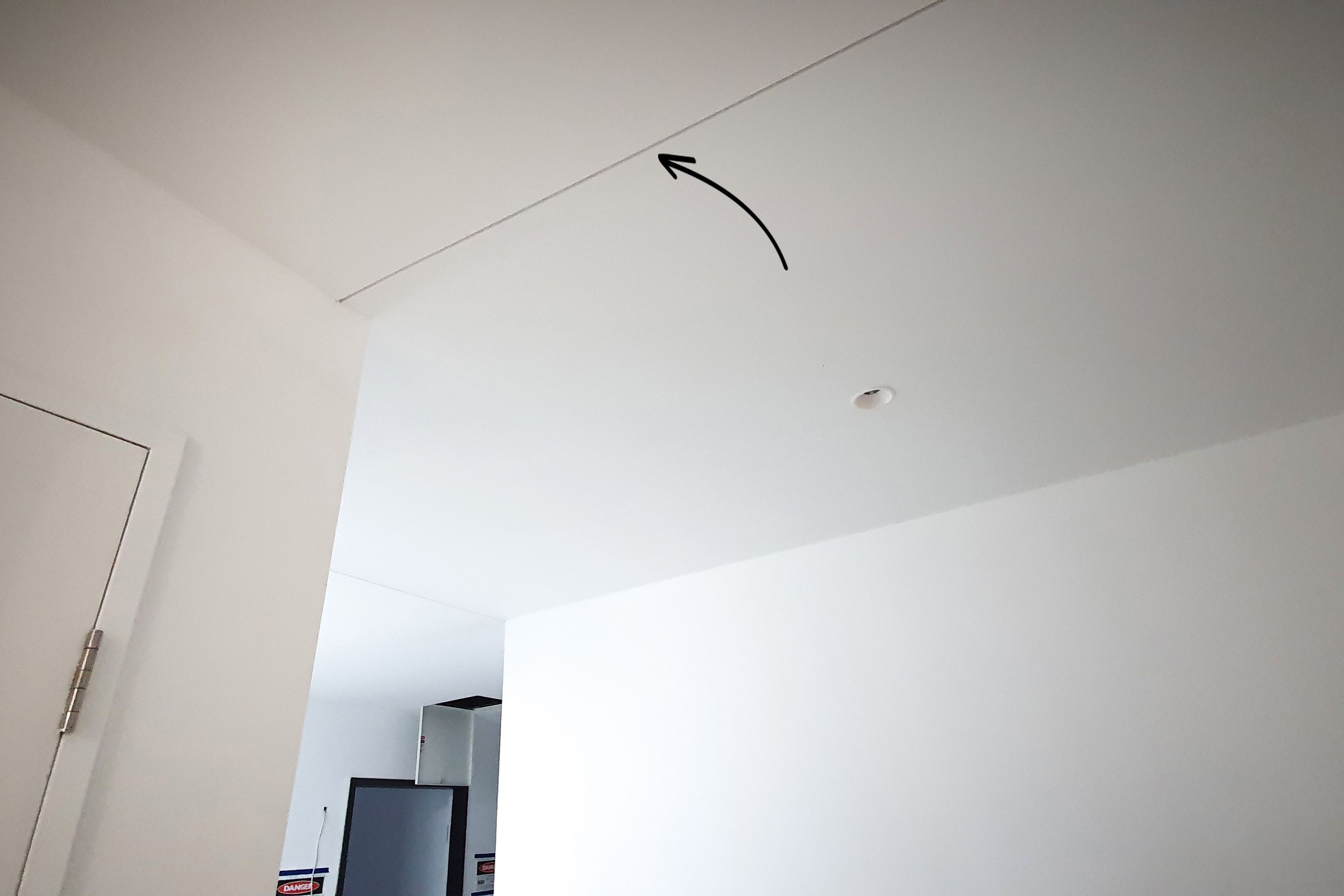 Why do plasterboard walls need expansion joints?