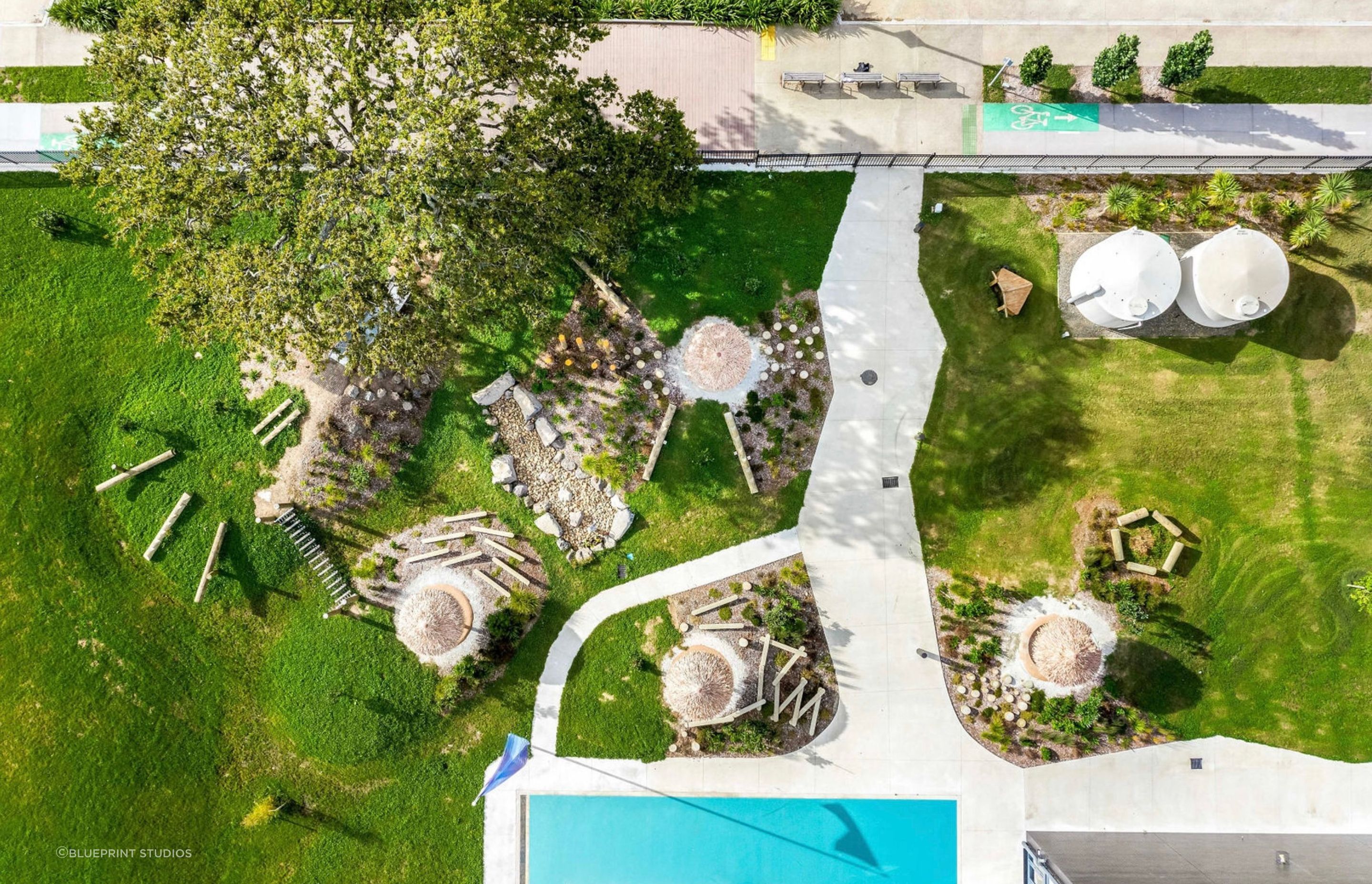 Inspired by the pāpaka (mud crab), this playground features grassy mounds and small planted gardens.