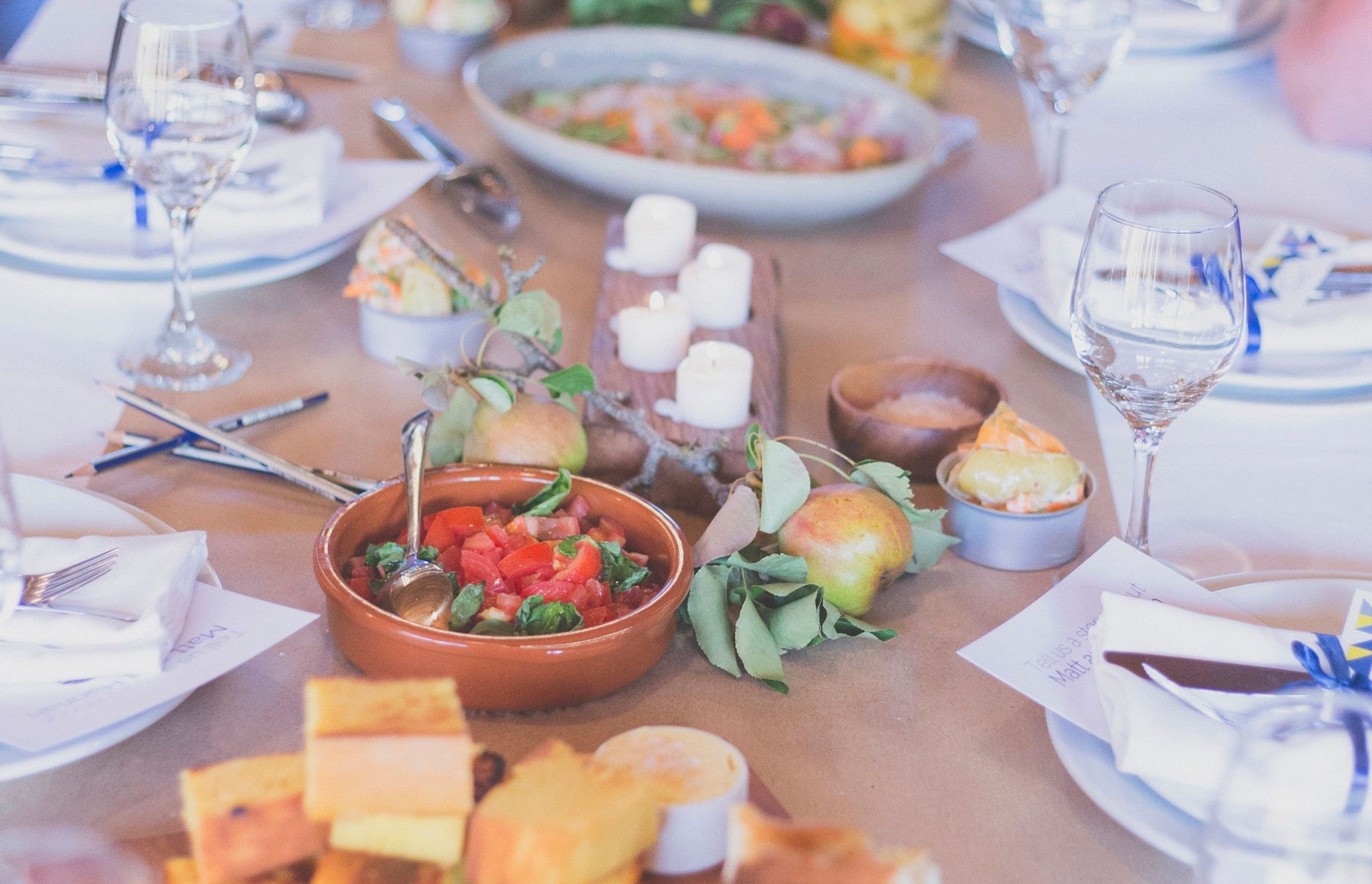 Feasting together around the table - a shared celebration.  Photo credit: Jenny Siaosi - Siaosi Photography