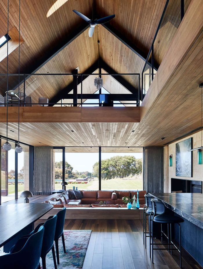 Inside the barn house, timber ceilings create a warm and inviting atmosphere Photographer: Shannon McGrath