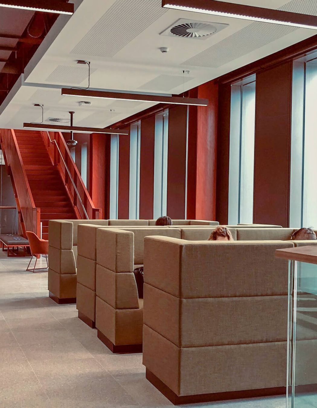 Custom high back modular lounges in collaborative hubs