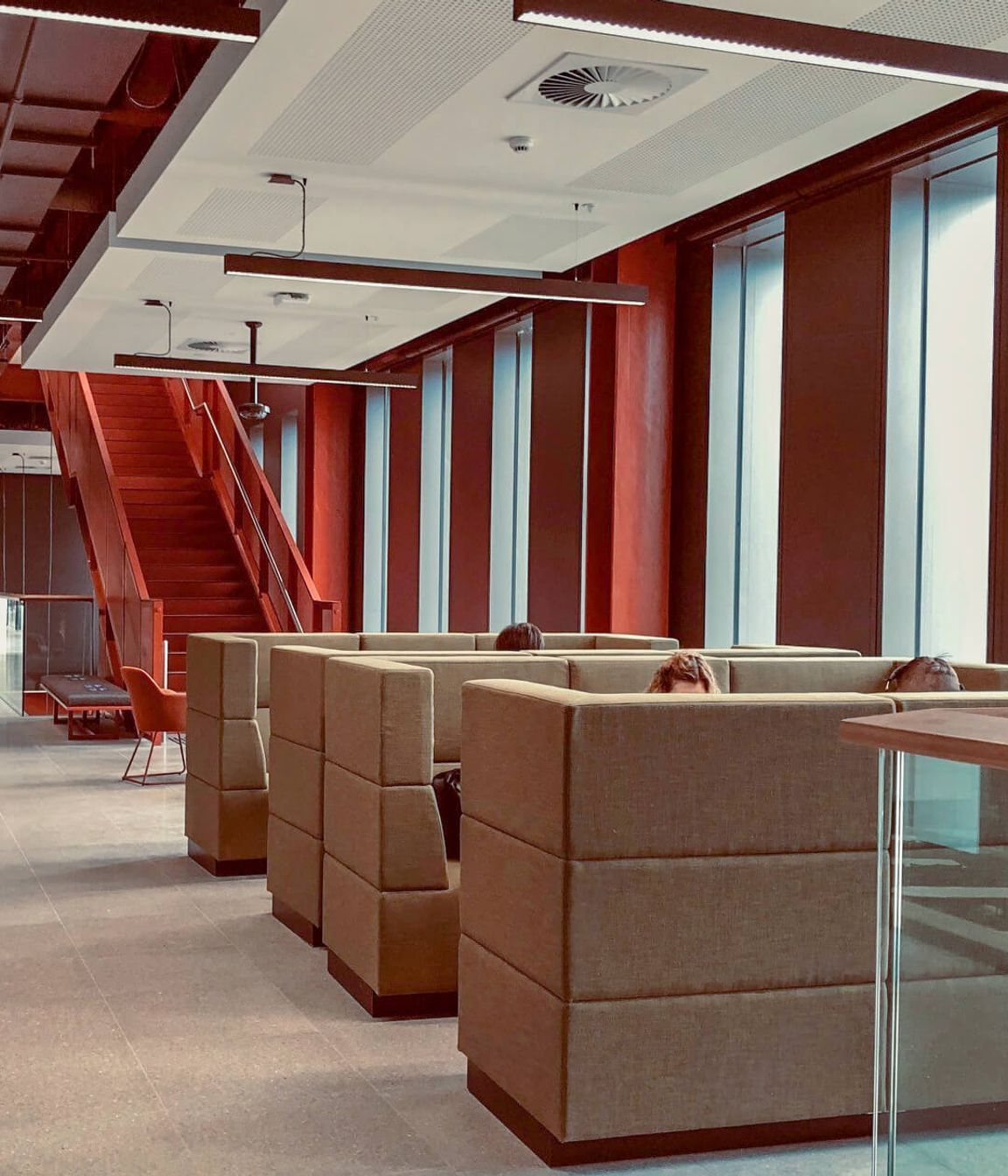 Custom high back modular lounges in collaborative hubs