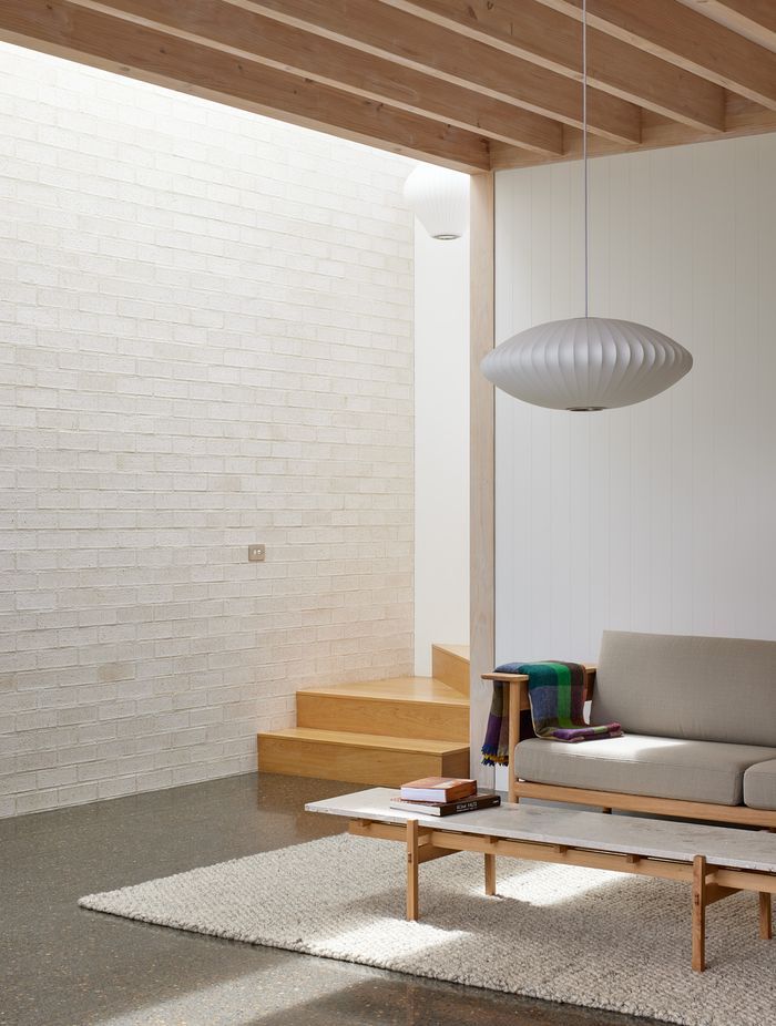 Point House by Guy Tarrant Architects with furniture from Good Form – N-CT01 Coffee Table and N-S01 Sofa by Karimoku Case