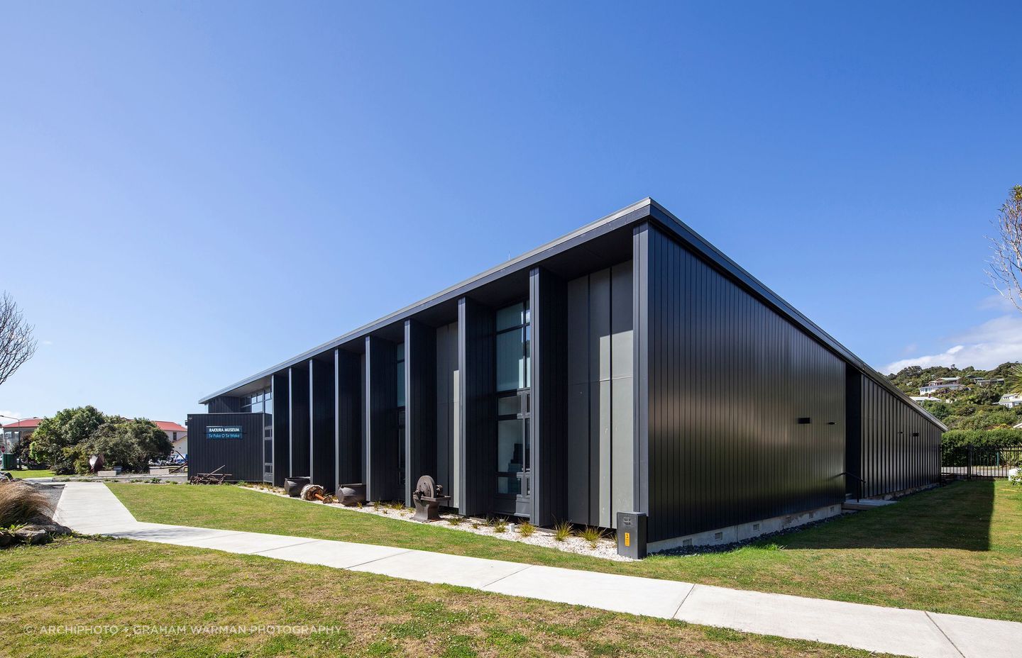 The bold, triangular shape of the building gives it a sculptural quality in the landscape.