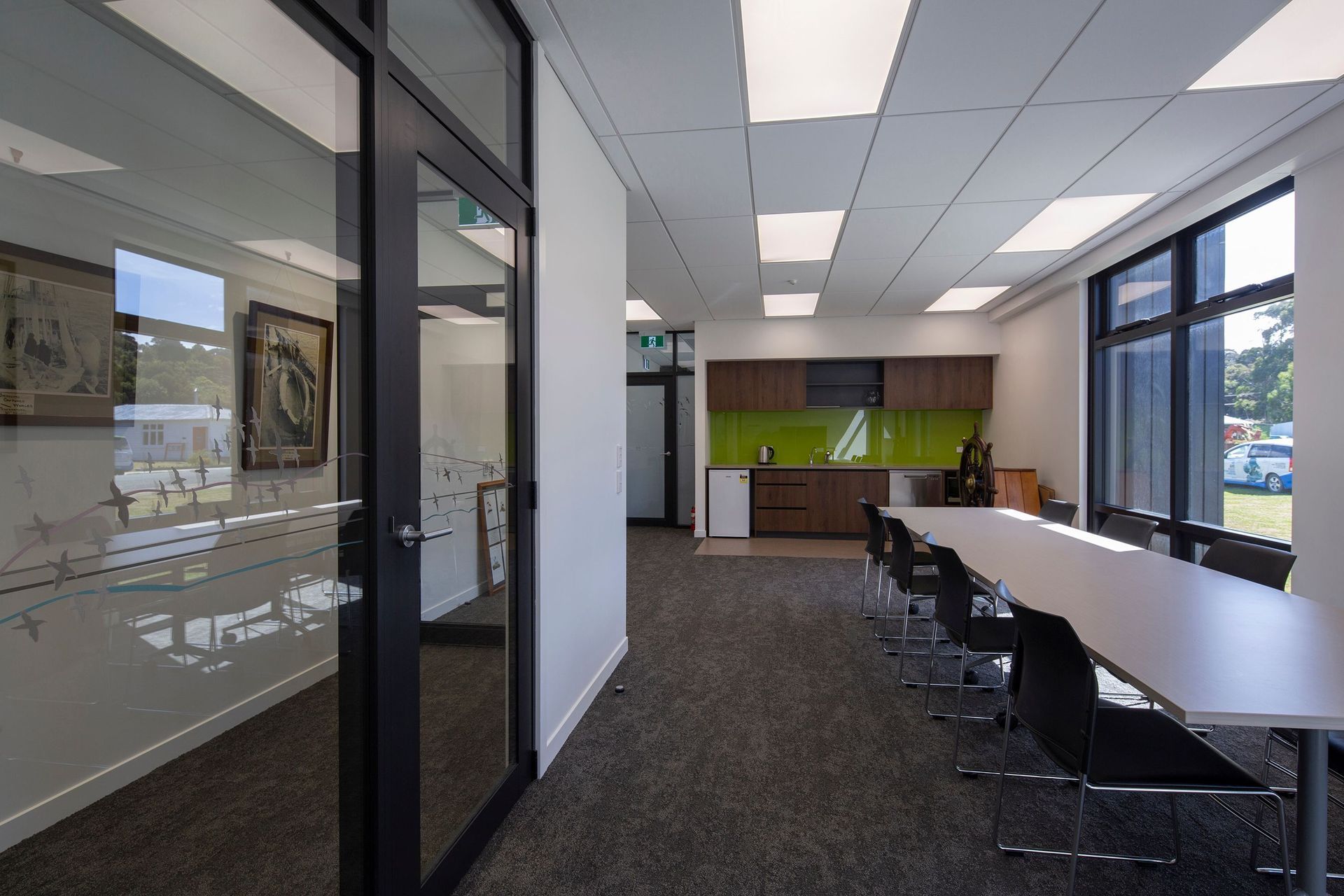 The cafeteria space does double duty as a space for public meetings and social gatherings.
