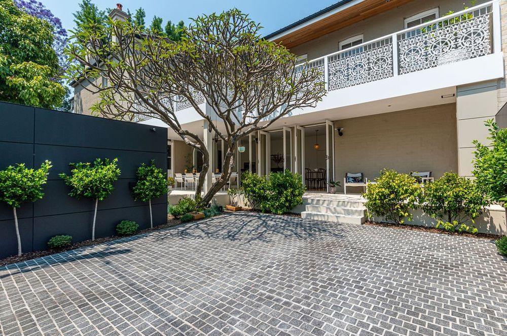 Charcoal Granite Cobblestones | Gardner Design &amp; Construction