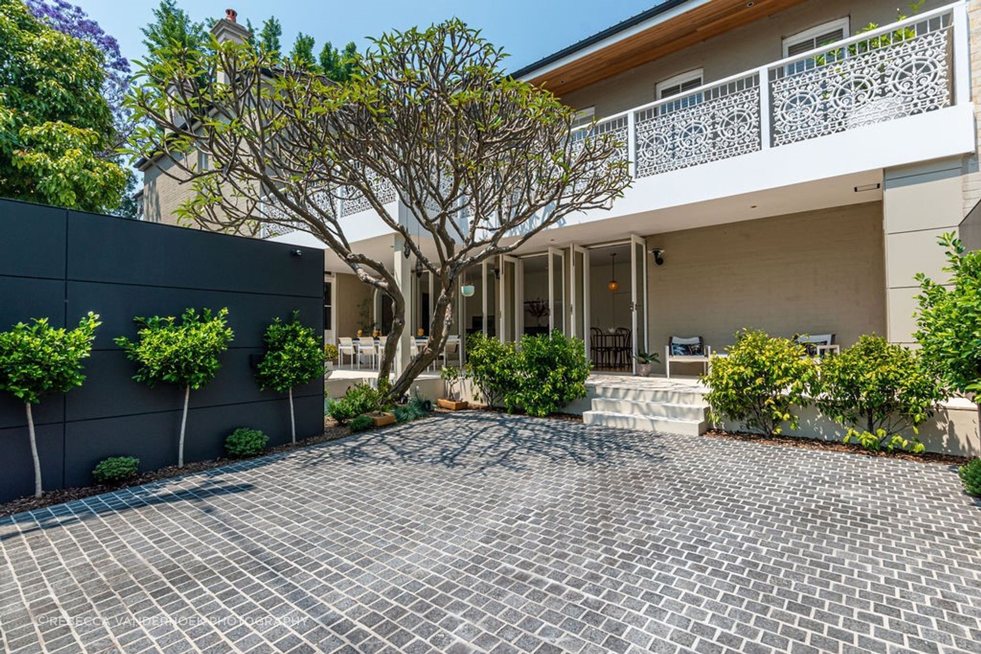 Charcoal Granite Cobblestones | Gardner Design &amp; Construction
