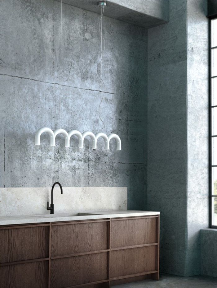 The Oblure Arch Pendant features bold forms and is available in any RAL colour to suit your space.