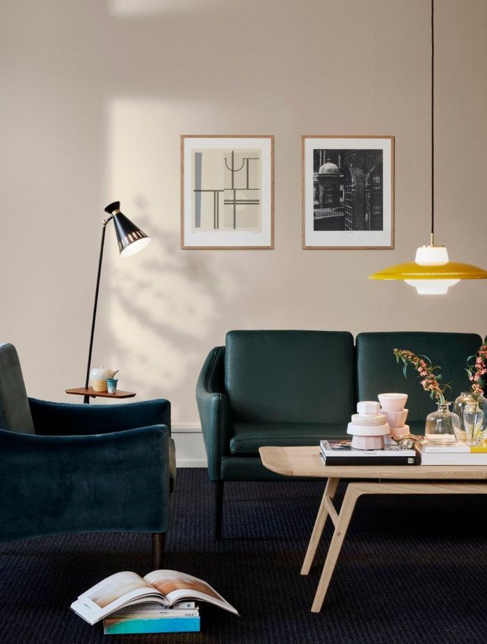 Warm Nordic Lamps offer an element of mid-century character with accent lighting pieces. These pieces utilise enduring design materials like opaline diffusers and saucer or cone shape shade forms. Image features the Cone Floor Lamp with Table and the Opal Shade Pendant.