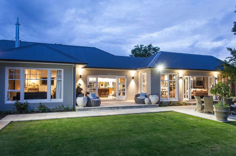 A wonderfully renovated stucco house that is impeccably designed and decorated.
