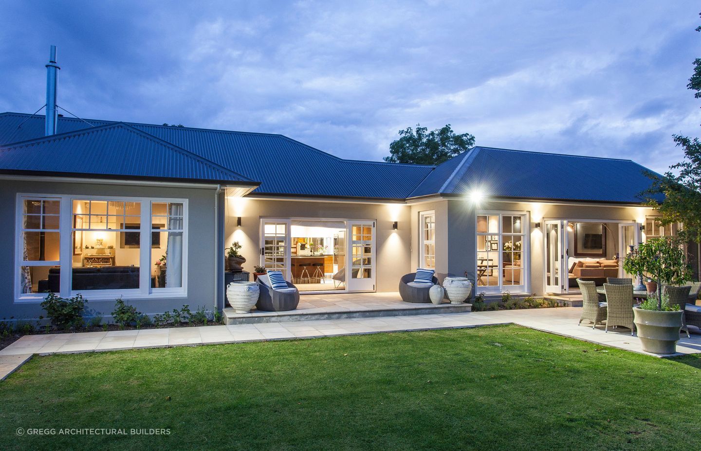 A wonderfully renovated stucco house that is impeccably designed and decorated.