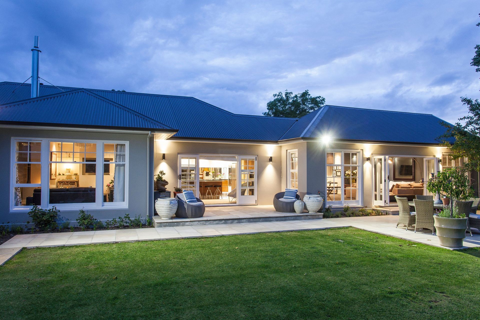 A wonderfully renovated stucco house that is impeccably designed and decorated.