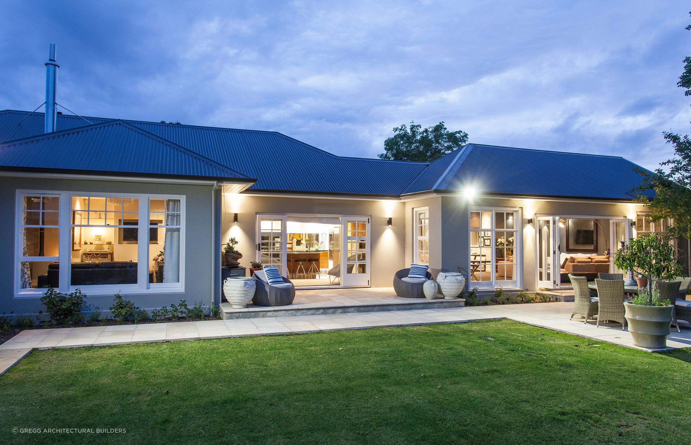 A wonderfully renovated stucco house that is impeccably designed and decorated.