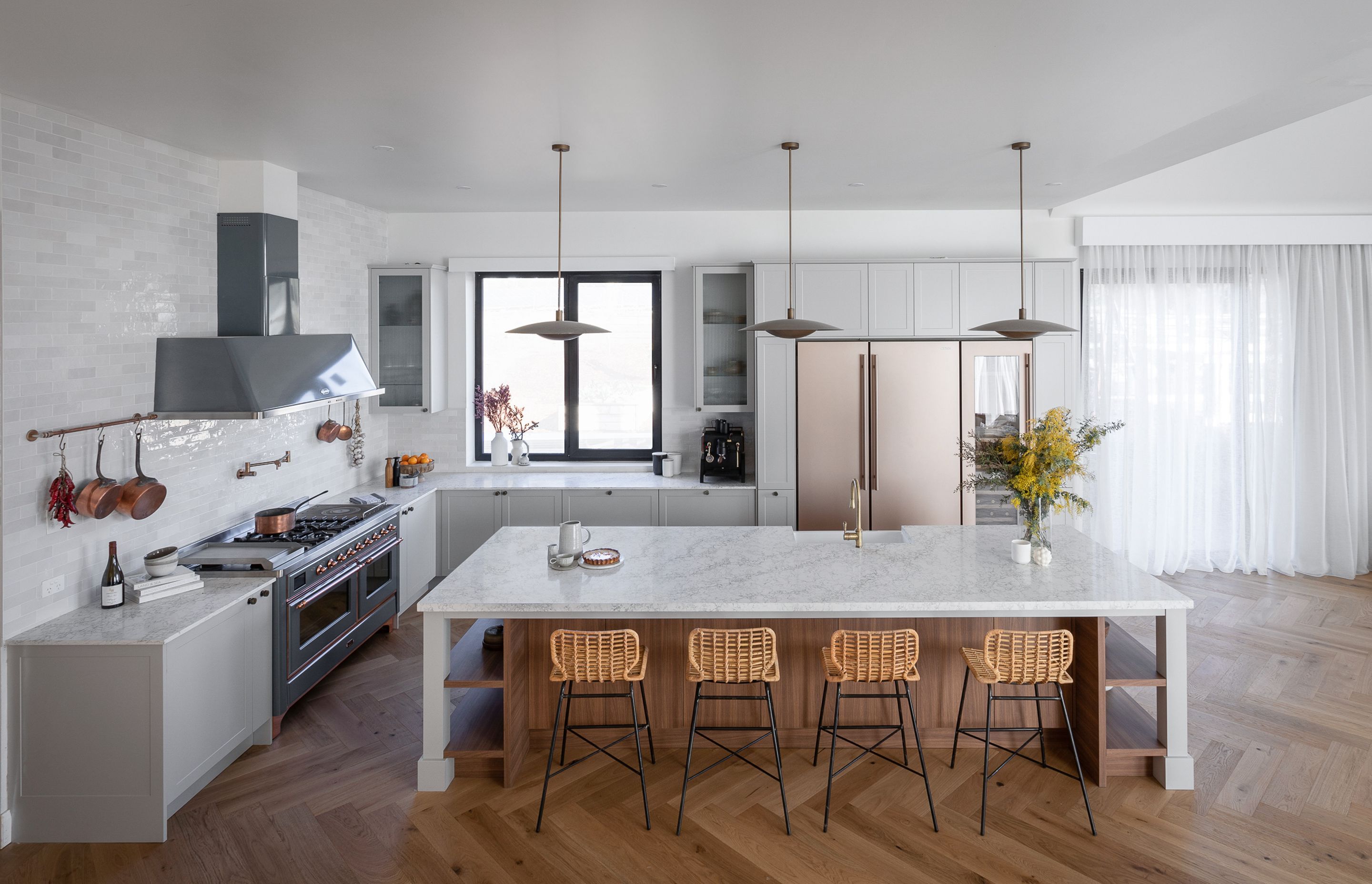 Image by: Freedom Kitchens, Tom and Sarah-Jane’s complimentary kitchen of bright whites and timber