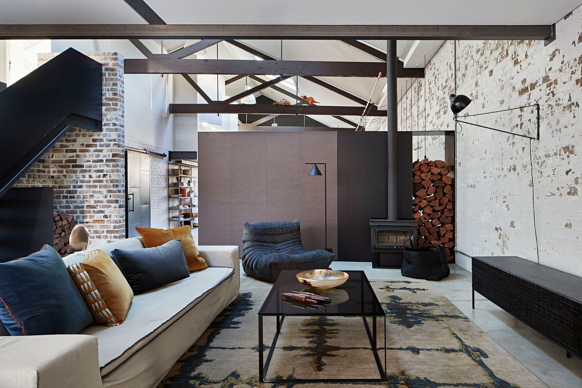 Exposed brick walls just one of many great features in this unique home converted from an old furniture factory