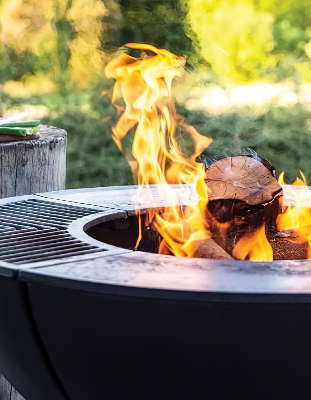 This outdoor fire pit works well as a functional grill.
