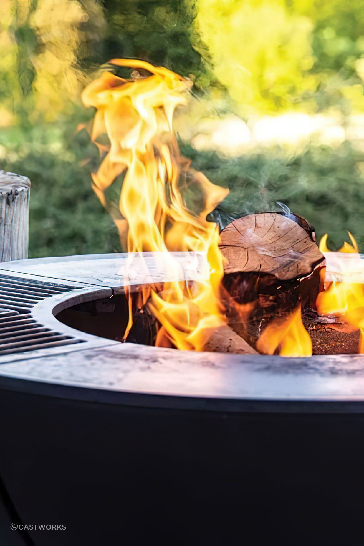 This outdoor fire pit works well as a functional grill.