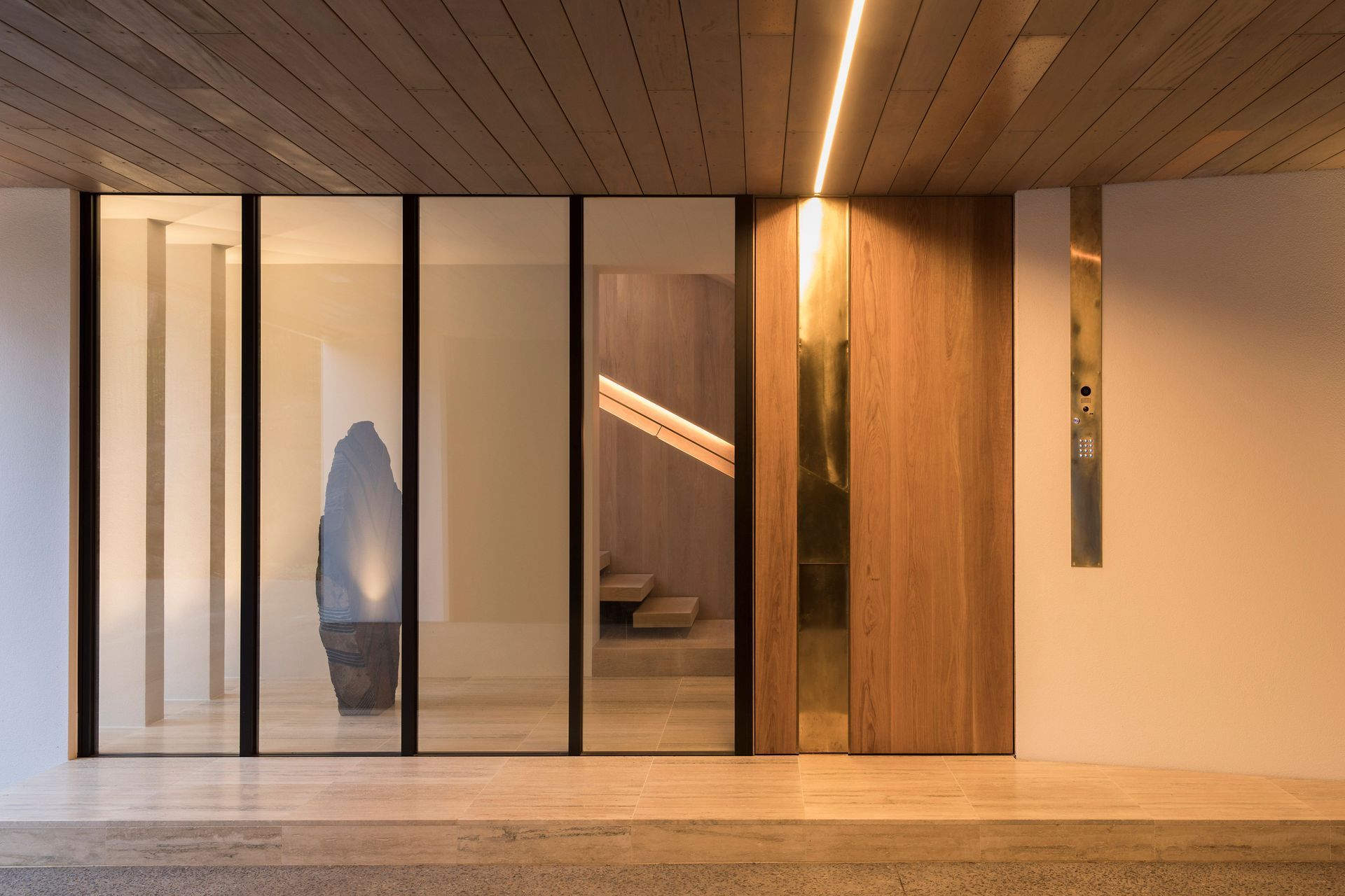 A feature sculpture takes centre stage in the entryway of this luxury home in Herne Bay - Photography: David Straight