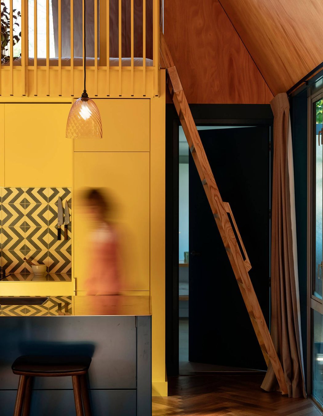 The mezzanine can be accessed by a stow-away ladder.