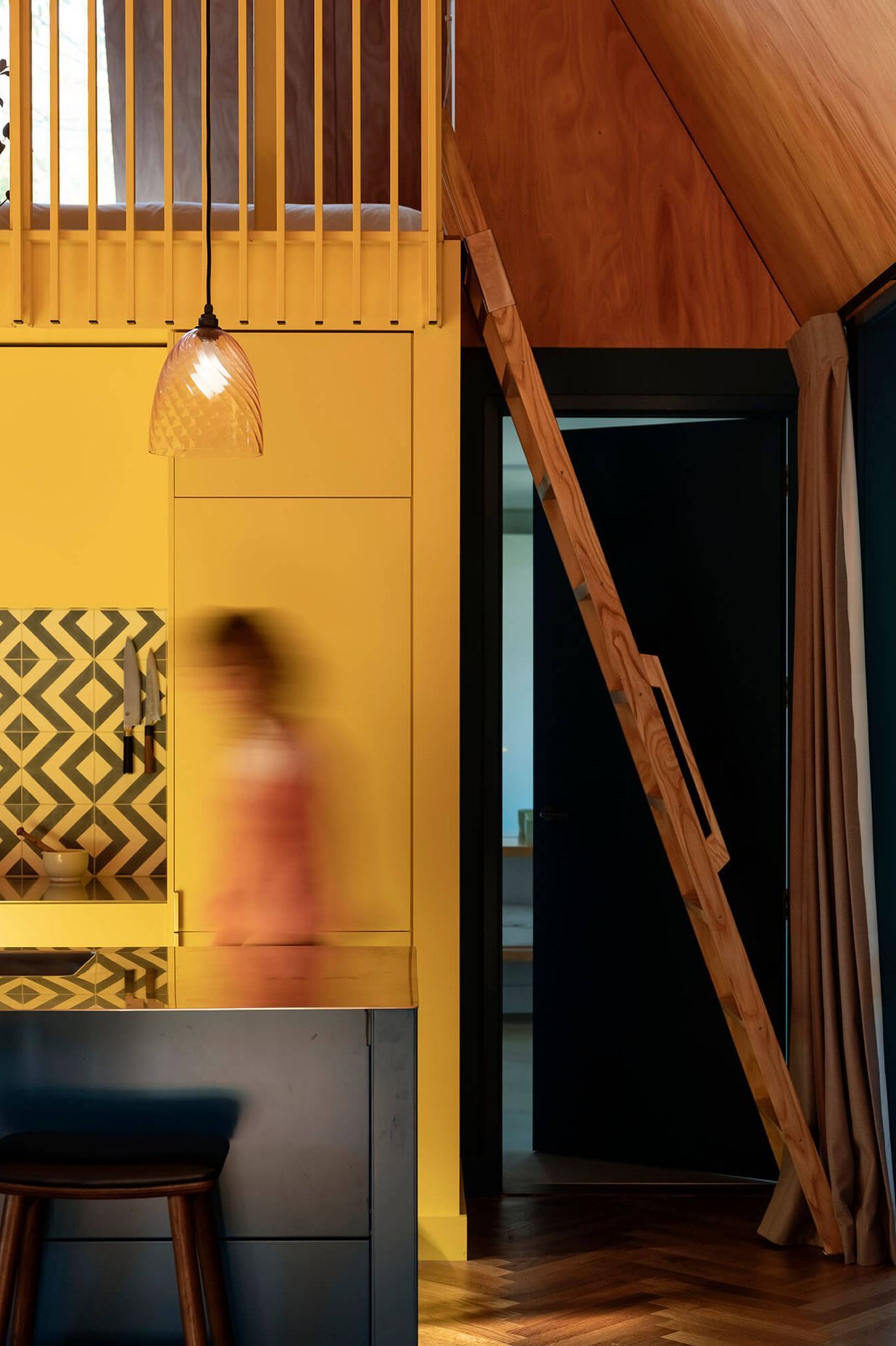 The mezzanine can be accessed by a stow-away ladder.