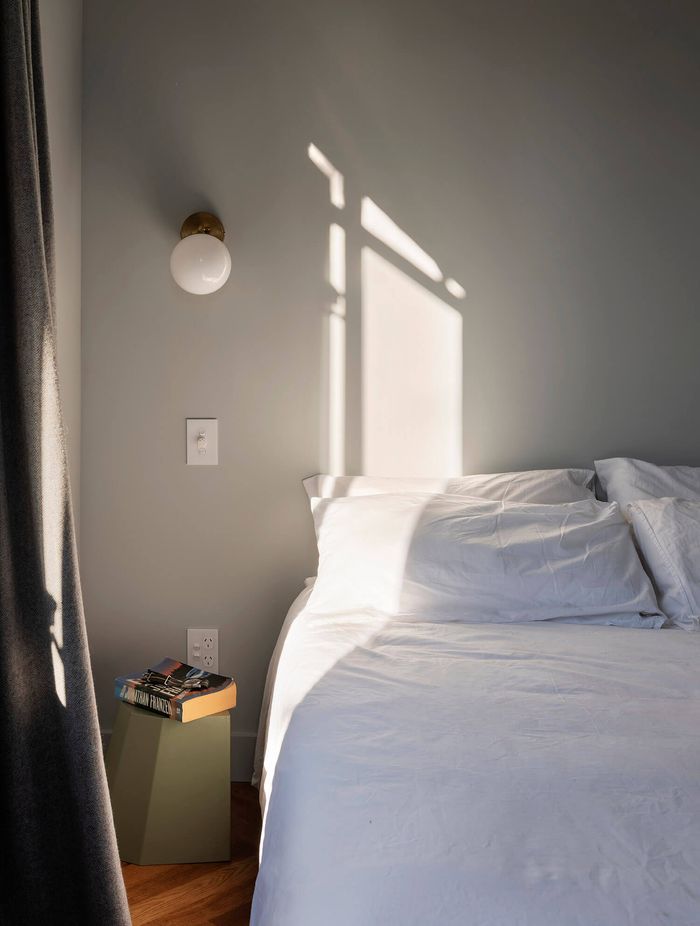 A tranquil colour palette was chosen for the bedroom.