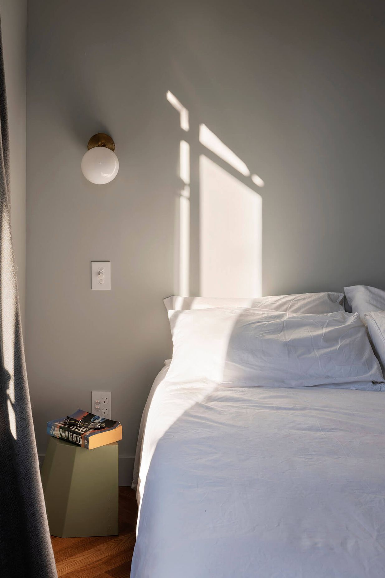 A tranquil colour palette was chosen for the bedroom.