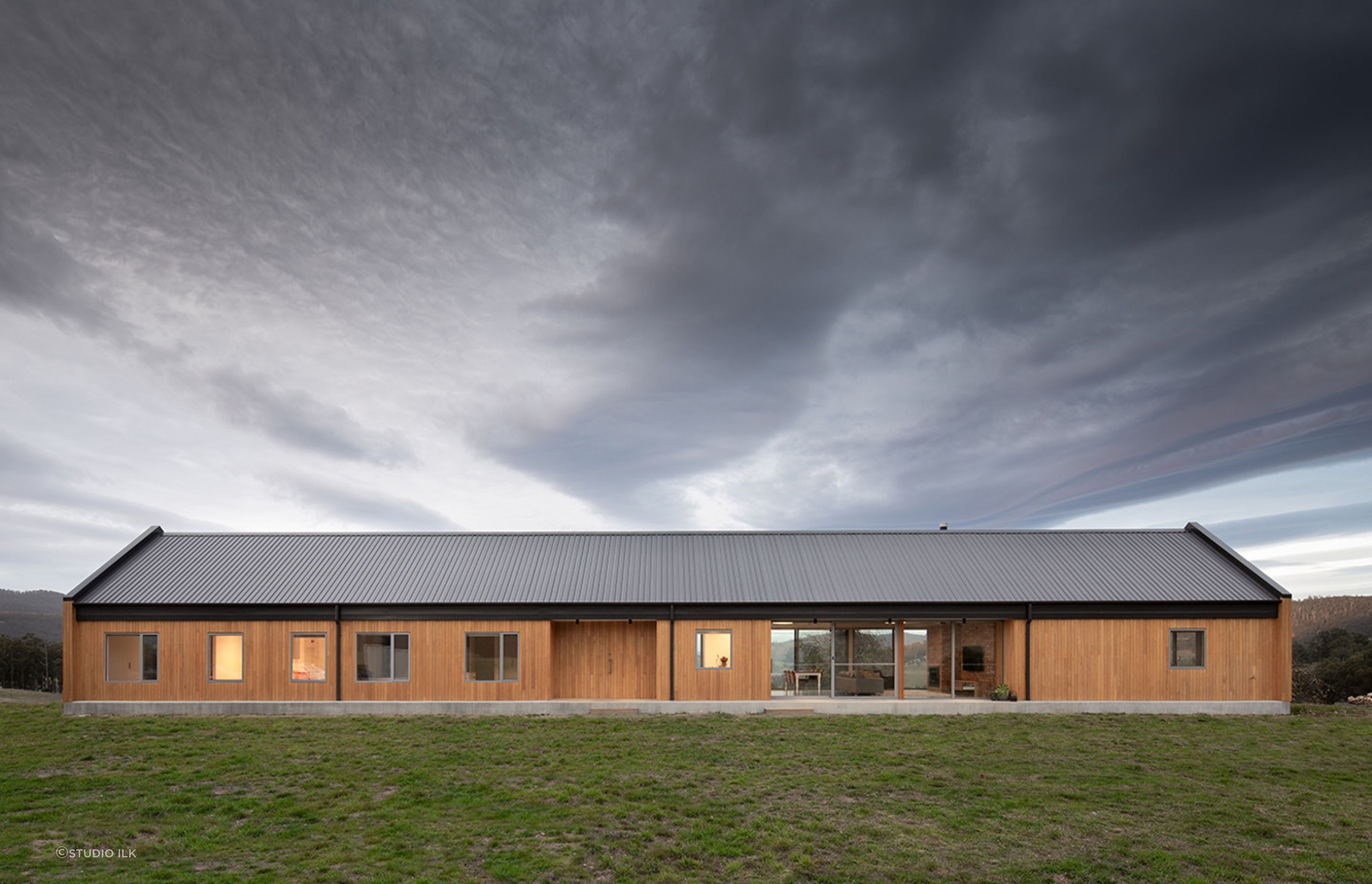 The design draws inspiration from traditional long houses. Photographer: Thomas Ryan.